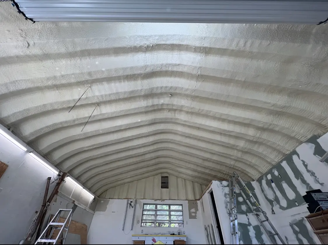 Spray polyurethane foam applied to the underside of a metal roof deck in East Kapolei
